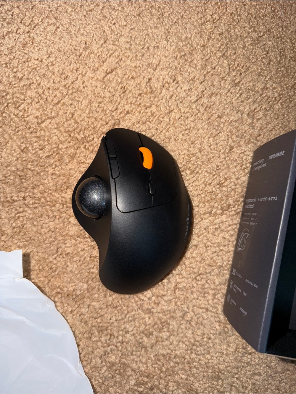Logitech Black Trackball Mouse with Orange Scroll Wheel